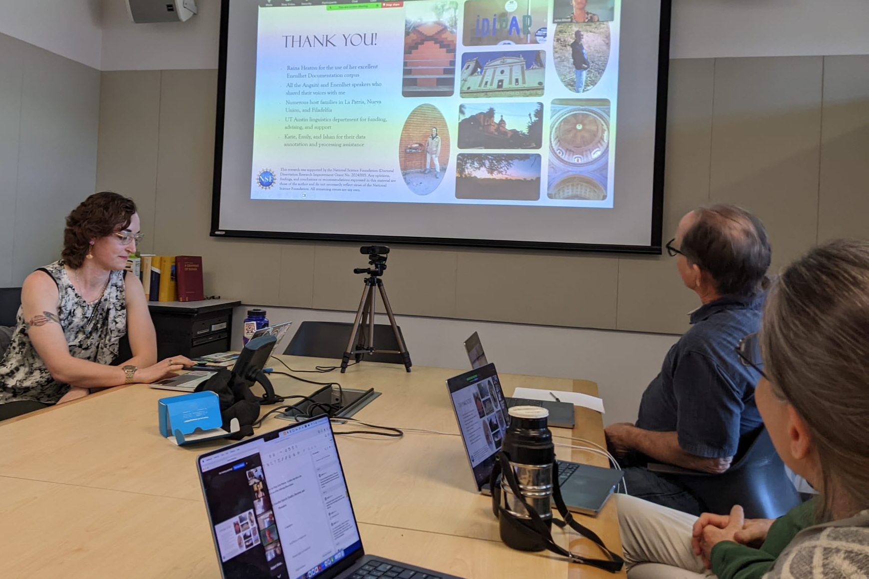 Desk with two overlapping notebooks and a pen, showing hand written to do lists and a list of references